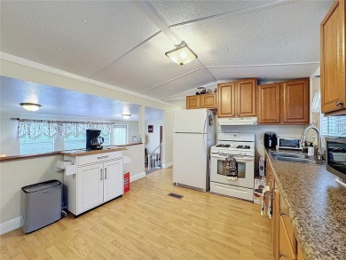 SNOWBIRDS OR HOMEOWNERS WELCOME- YOU OWN the land. 2 Bedroom on Glen Lakes Country Club in Florida - for sale on GolfHomes.com, golf home, golf lot