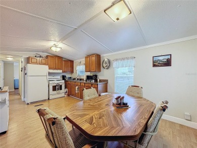 SNOWBIRDS OR HOMEOWNERS WELCOME- YOU OWN the land. 2 Bedroom on Glen Lakes Country Club in Florida - for sale on GolfHomes.com, golf home, golf lot