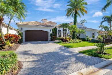 Nestled in the RARELY available Sand Cay community, this lovely on Ibis Golf and Country Club in Florida - for sale on GolfHomes.com, golf home, golf lot