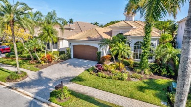Nestled in the RARELY available Sand Cay community, this lovely on Ibis Golf and Country Club in Florida - for sale on GolfHomes.com, golf home, golf lot