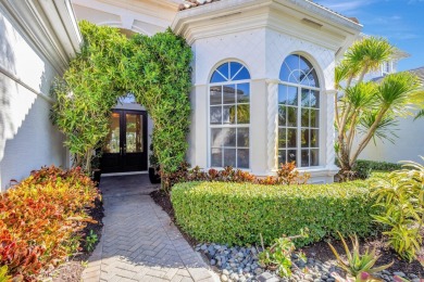 Nestled in the RARELY available Sand Cay community, this lovely on Ibis Golf and Country Club in Florida - for sale on GolfHomes.com, golf home, golf lot
