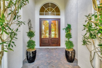Nestled in the RARELY available Sand Cay community, this lovely on Ibis Golf and Country Club in Florida - for sale on GolfHomes.com, golf home, golf lot