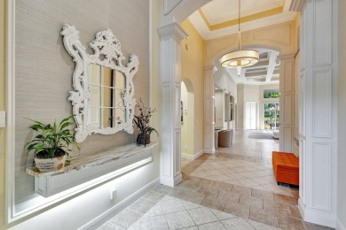 Nestled in the RARELY available Sand Cay community, this lovely on Ibis Golf and Country Club in Florida - for sale on GolfHomes.com, golf home, golf lot