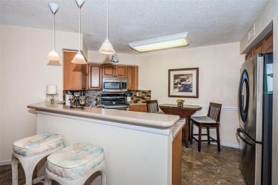 Vista Verde East ground floor unit in excellent condition on Isla Del Sol Yacht and Country Club in Florida - for sale on GolfHomes.com, golf home, golf lot