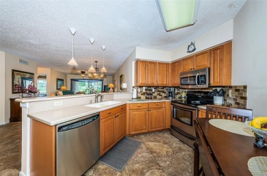 Vista Verde East ground floor unit in excellent condition on Isla Del Sol Yacht and Country Club in Florida - for sale on GolfHomes.com, golf home, golf lot