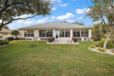 OUTSTANDING GOLF FRONT CUSTOM GRANVILLE IN WINDWARD HILLS WITH on Eagle Ridge At Spruce Creek Country Club in Florida - for sale on GolfHomes.com, golf home, golf lot