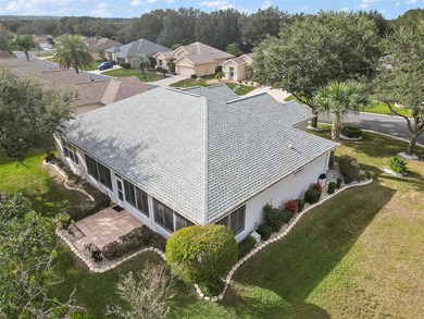OUTSTANDING GOLF FRONT CUSTOM GRANVILLE IN WINDWARD HILLS WITH on Eagle Ridge At Spruce Creek Country Club in Florida - for sale on GolfHomes.com, golf home, golf lot
