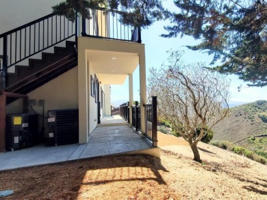 This is a beautiful, brand new home that has soaring views on Carmel Valley Ranch Golf Course in California - for sale on GolfHomes.com, golf home, golf lot