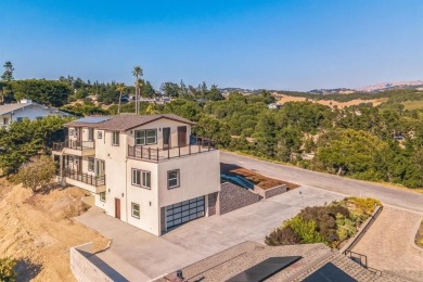 This is a beautiful, brand new home that has soaring views on Carmel Valley Ranch Golf Course in California - for sale on GolfHomes.com, golf home, golf lot