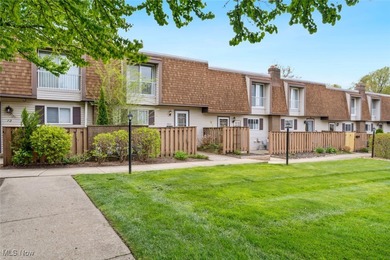 Welcome to this Mansard-roofed townhome nestled in the serene on Ridgewood Golf Course in Ohio - for sale on GolfHomes.com, golf home, golf lot