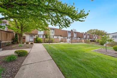 Welcome to this Mansard-roofed townhome nestled in the serene on Ridgewood Golf Course in Ohio - for sale on GolfHomes.com, golf home, golf lot
