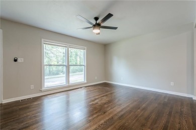 This home qualifies for up to $15,000 in grants--no income on Browns Mill Golf Course in Georgia - for sale on GolfHomes.com, golf home, golf lot