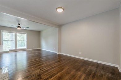 This home qualifies for up to $15,000 in grants--no income on Browns Mill Golf Course in Georgia - for sale on GolfHomes.com, golf home, golf lot