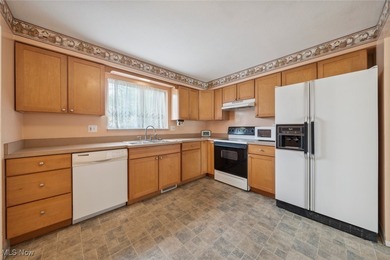 Welcome to this Mansard-roofed townhome nestled in the serene on Ridgewood Golf Course in Ohio - for sale on GolfHomes.com, golf home, golf lot