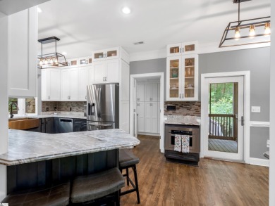 Discover a residence where timeless quality meets refined design on The Cliffs Valley Golf Course in South Carolina - for sale on GolfHomes.com, golf home, golf lot