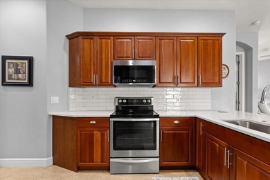 Experience elevated Florida living in this elegant villa-style on DeBary Golf and Country Club in Florida - for sale on GolfHomes.com, golf home, golf lot