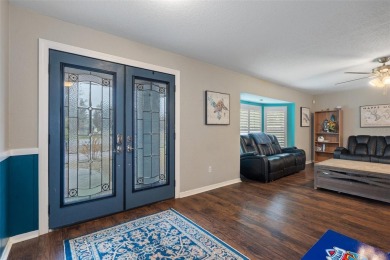 Under contract-accepting backup offers. Charming 3-Bedroom on Oak Hills Country Club in Florida - for sale on GolfHomes.com, golf home, golf lot