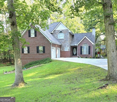 Beautifully maintained 4BR/3.5BA home in the gated community of on Fairfield Plantation Golf and Country Club in Georgia - for sale on GolfHomes.com, golf home, golf lot