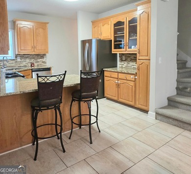 Beautifully maintained 4BR/3.5BA home in the gated community of on Fairfield Plantation Golf and Country Club in Georgia - for sale on GolfHomes.com, golf home, golf lot