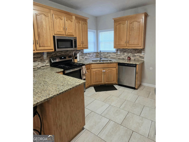 Beautifully maintained 4BR/3.5BA home in the gated community of on Fairfield Plantation Golf and Country Club in Georgia - for sale on GolfHomes.com, golf home, golf lot