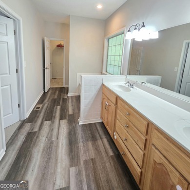 Beautifully maintained 4BR/3.5BA home in the gated community of on Fairfield Plantation Golf and Country Club in Georgia - for sale on GolfHomes.com, golf home, golf lot