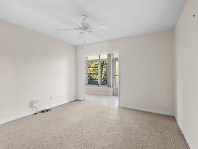 Welcome to this charming 2-bedroom, 2-bath first-floor corner on The American Golf Club in Florida - for sale on GolfHomes.com, golf home, golf lot