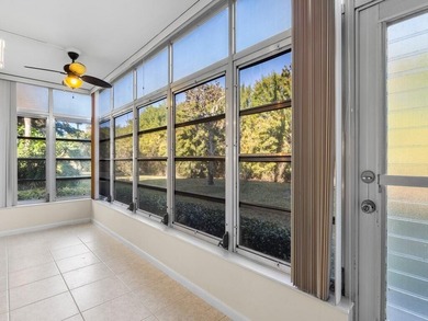 Welcome to this charming 2-bedroom, 2-bath first-floor corner on The American Golf Club in Florida - for sale on GolfHomes.com, golf home, golf lot