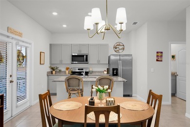 This recently built townhouse offers comfort, style, and on Venetian Bay Golf Course in Florida - for sale on GolfHomes.com, golf home, golf lot