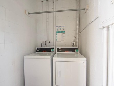 Welcome to this charming 2-bedroom, 2-bath first-floor corner on The American Golf Club in Florida - for sale on GolfHomes.com, golf home, golf lot