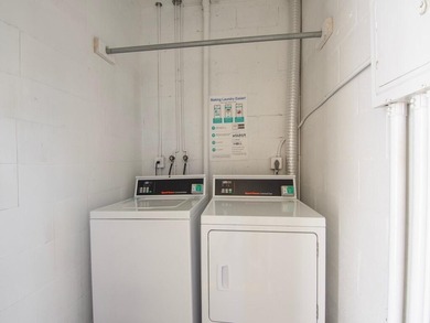 Welcome to this charming 2-bedroom, 2-bath first-floor corner on The American Golf Club in Florida - for sale on GolfHomes.com, golf home, golf lot