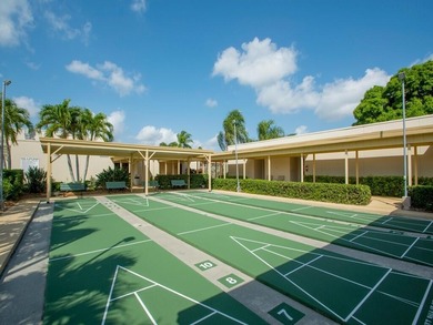 Welcome to this charming 2-bedroom, 2-bath first-floor corner on The American Golf Club in Florida - for sale on GolfHomes.com, golf home, golf lot