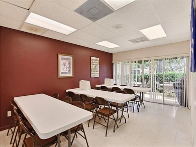 Welcome to this charming 2-bedroom, 2-bath first-floor corner on The American Golf Club in Florida - for sale on GolfHomes.com, golf home, golf lot