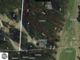 Beautiful building lot overlooking the 17th fairway of the on Michaywe Pines Course in Michigan - for sale on GolfHomes.com, golf home, golf lot