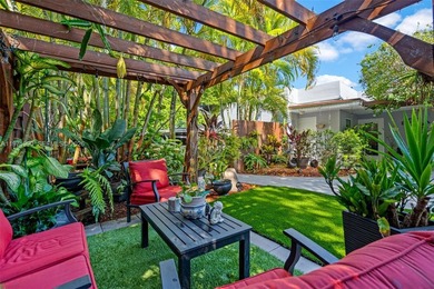 Welcome to your private oasis in the highly sought-after Country on Country Club of Miami in Florida - for sale on GolfHomes.com, golf home, golf lot