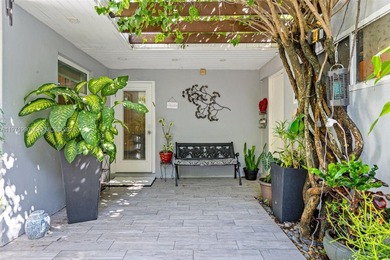 Welcome to your private oasis in the highly sought-after Country on Country Club of Miami in Florida - for sale on GolfHomes.com, golf home, golf lot