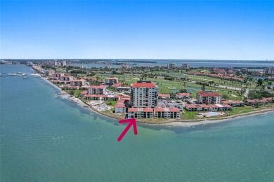 MILLION DOLLAR WATER VIEWS! From the moment you enter this on Isla Del Sol Yacht and Country Club in Florida - for sale on GolfHomes.com, golf home, golf lot