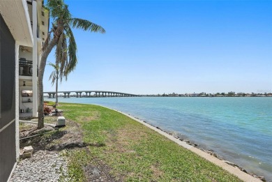 MILLION DOLLAR WATER VIEWS! From the moment you enter this on Isla Del Sol Yacht and Country Club in Florida - for sale on GolfHomes.com, golf home, golf lot