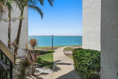 MILLION DOLLAR WATER VIEWS! From the moment you enter this on Isla Del Sol Yacht and Country Club in Florida - for sale on GolfHomes.com, golf home, golf lot