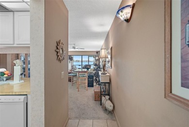 MILLION DOLLAR WATER VIEWS! From the moment you enter this on Isla Del Sol Yacht and Country Club in Florida - for sale on GolfHomes.com, golf home, golf lot