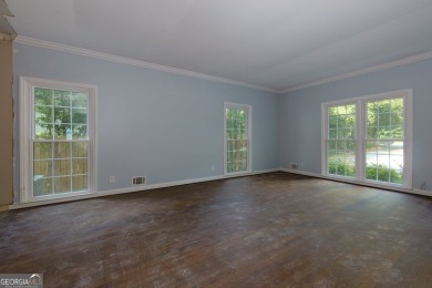 Beautiful spacious fixer upper in the heart of Buckhead.  This on Bobby Jones Golf Club in Georgia - for sale on GolfHomes.com, golf home, golf lot