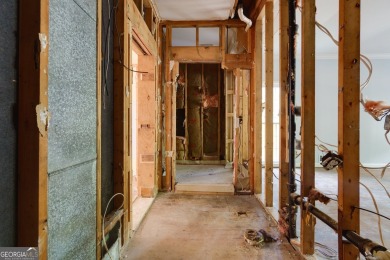 Beautiful spacious fixer upper in the heart of Buckhead.  This on Bobby Jones Golf Club in Georgia - for sale on GolfHomes.com, golf home, golf lot