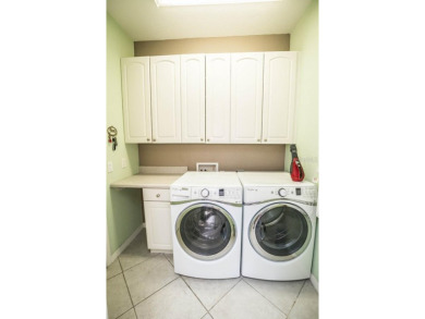 Your Perfect retirement maintenance free condo, sits on a large on Scepter Golf Club in Florida - for sale on GolfHomes.com, golf home, golf lot