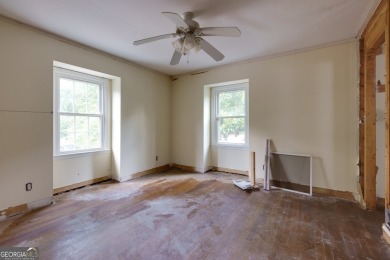 Beautiful spacious fixer upper in the heart of Buckhead.  This on Bobby Jones Golf Club in Georgia - for sale on GolfHomes.com, golf home, golf lot