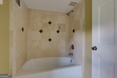 Beautiful spacious fixer upper in the heart of Buckhead.  This on Bobby Jones Golf Club in Georgia - for sale on GolfHomes.com, golf home, golf lot