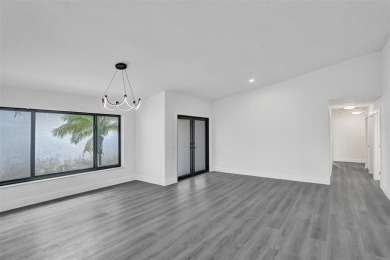 Welcome to this stunning three-bedroom, three-bath home in Boca on  in Florida - for sale on GolfHomes.com, golf home, golf lot