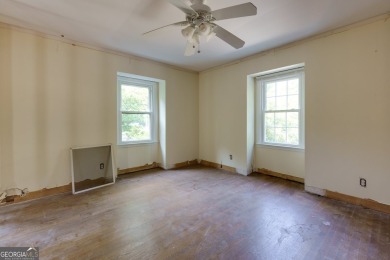Beautiful spacious fixer upper in the heart of Buckhead.  This on Bobby Jones Golf Club in Georgia - for sale on GolfHomes.com, golf home, golf lot