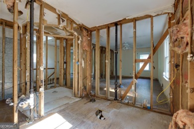 Beautiful spacious fixer upper in the heart of Buckhead.  This on Bobby Jones Golf Club in Georgia - for sale on GolfHomes.com, golf home, golf lot