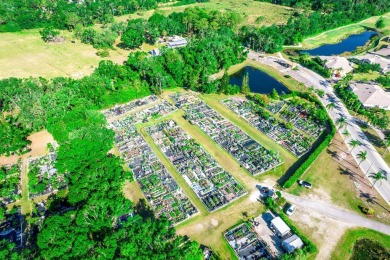 Your Perfect retirement maintenance free condo, sits on a large on Scepter Golf Club in Florida - for sale on GolfHomes.com, golf home, golf lot