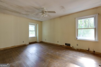 Beautiful spacious fixer upper in the heart of Buckhead.  This on Bobby Jones Golf Club in Georgia - for sale on GolfHomes.com, golf home, golf lot