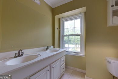 Beautiful spacious fixer upper in the heart of Buckhead.  This on Bobby Jones Golf Club in Georgia - for sale on GolfHomes.com, golf home, golf lot